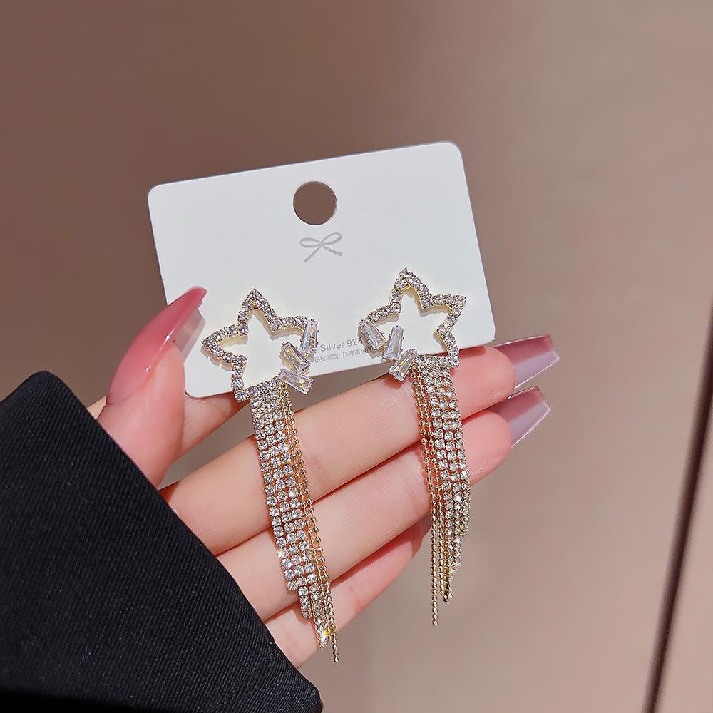 

Korean-Style Silver Needle Long Star Earrings: High-End Women s Fashion with Exquisite Niche Design