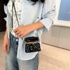 Xiaoxiangfeng rhombus chain bag 2025 new fashion rivet shoulder bag women's foreign style versatile clip buckle small square bag