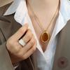 European and American exaggerated water drop-shaped large pendant inlaid with natural tiger's eye stone necklace texture Hepburn style temperament