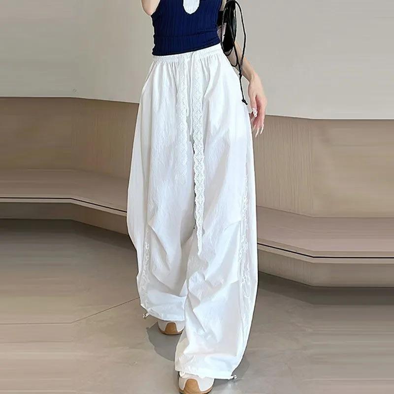 Pantaloni Larghi da Donna Extra Lunghi con Pannelli Laterali in Pizzo Vita Elasticizzata