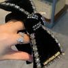 Schwarzes Samt Strass Schleifen Haarband: Vielseitiges Waschgesichts- und Ausgeh-Accessoire.