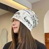 Korean-Style Distressed Beanie: Women's Ripped Letter Slouchy Hat for Large Heads, Small Face Look, Trendy Yarmulke Style.