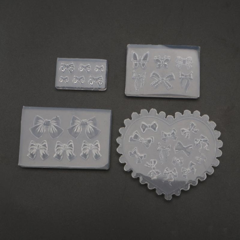 Sculpture Stamping Plate Nails Art Stencils Crystal Epoxy Resin Mold Silicone Nail Carving Mold 3D Mini Bowknot Mould