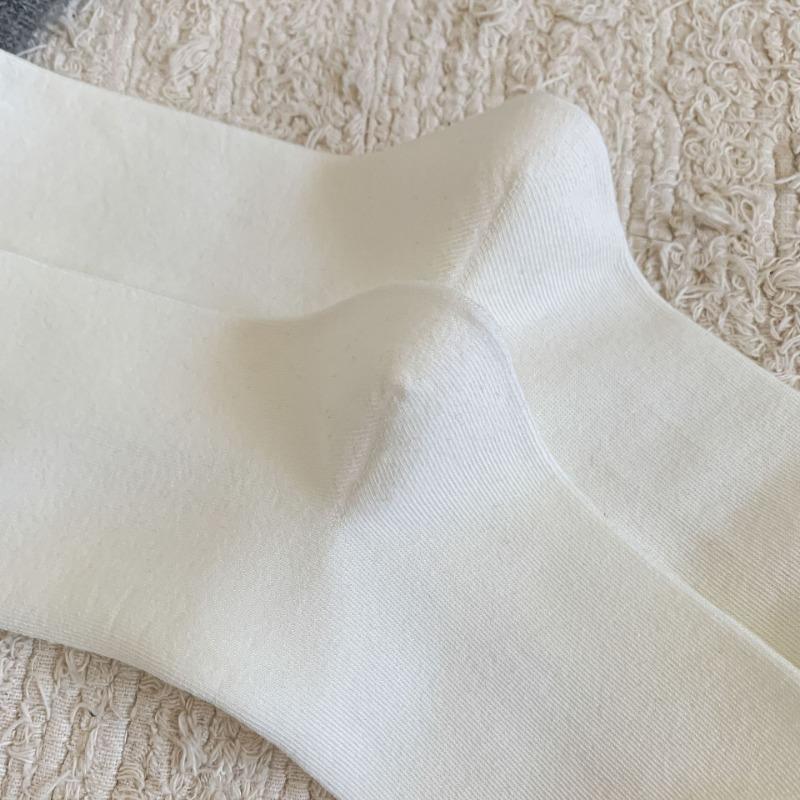 Basic solid color slim calf socks gentle wind soft waxy skin-friendly autumn and winter cotton socks Zhuji pure cotton women's medium tube socks