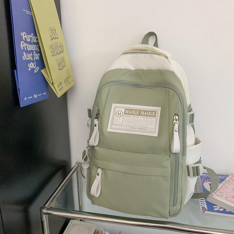 The schoolbag is high-value, fresh and cute, the schoolbag is casual, simple and light, and the commute is versatile and large capacity.