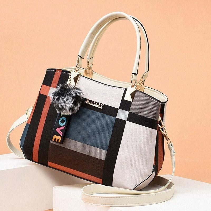 Fashionable Female Handbag With Large Capacity And Inner Zipper Pockets For Daily Carry