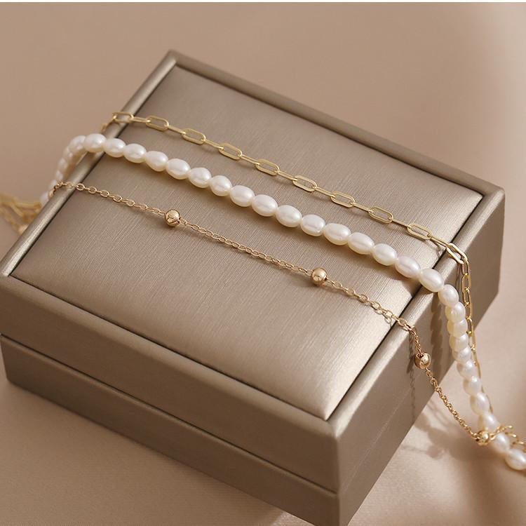 Natural freshwater pearl necklace women's niche design splicing round brand pendant collarbone chain sweater chain