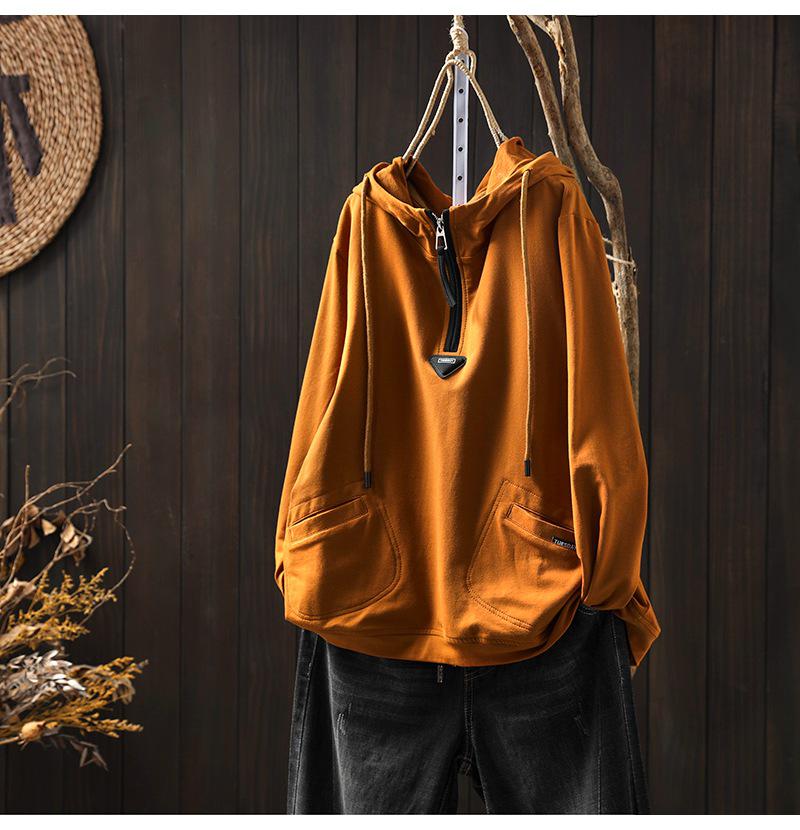 Women's Hooded Half-Zip Hoodie: Large Pockets, Subtle Logo, Stylish Loose-Fit, Casual Long-Sleeve Top