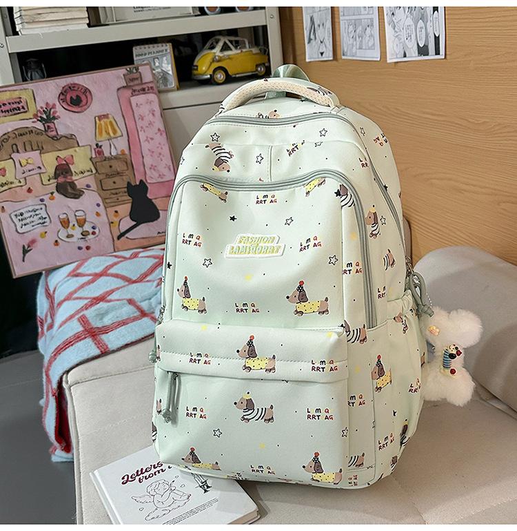 Schoolbag Japanese ins cute schoolbag girl, junior high school girl, high school student, large capacity load reduction class backpack student