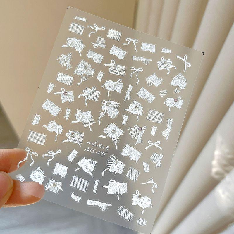 

Lace Bows Pearl Bright Crystal Nail Art Sticker Three-Dimensional Relief with Adhesive Tape Mesh Wedding Nail Fingernail Decoration Decals MS495 Crystal drill