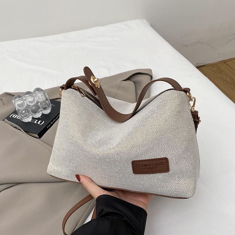 Niche design bag women's bag large capacity messenger bag knitted cloth shoulder armpit bag