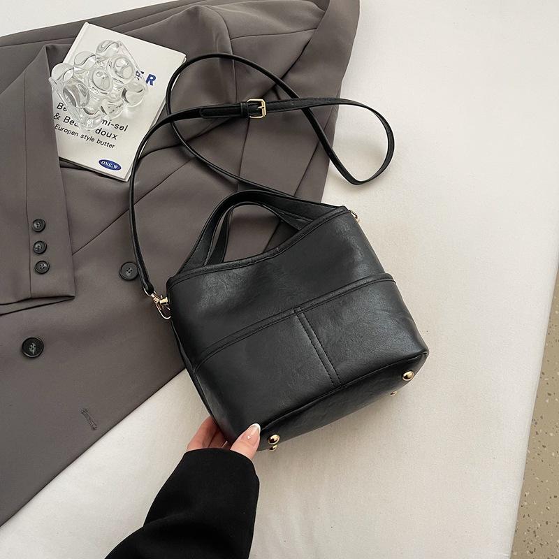 Urban simple trend handbag women's messenger bag 2025 new simple bucket bag solid color shoulder messenger bag
