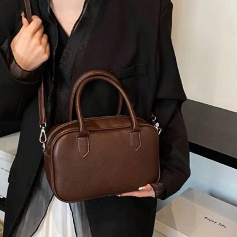 Einfache einfarbige Retro-Handtasche Bowling-Tasche für Damen Koreanische Neue Winter Pendeln Mode Ein Schulter Crossbody Kissen-Tasche