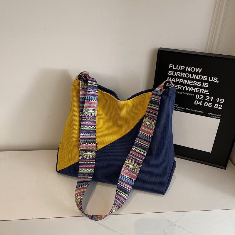 

Niche high-value fashion contrasting color tote bag autumn and winter new large-capacity splicing shoulder bag women