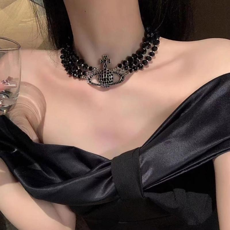 Elegante mehrschichtige schwarze Kristall-Planeten-Anhänger-Halskette Perlenhalskette für modebewusste Frauen, die einzigartige Stile suchen