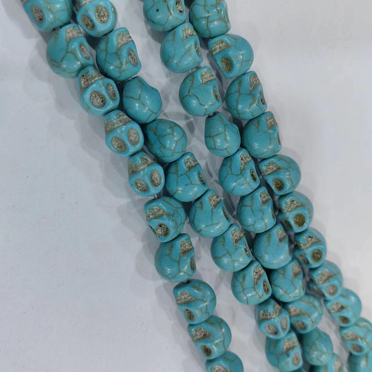 

Бирюзовые и белые бусины-черепа для изготовления украшений своими руками 6×8mm / about 48 beads per string