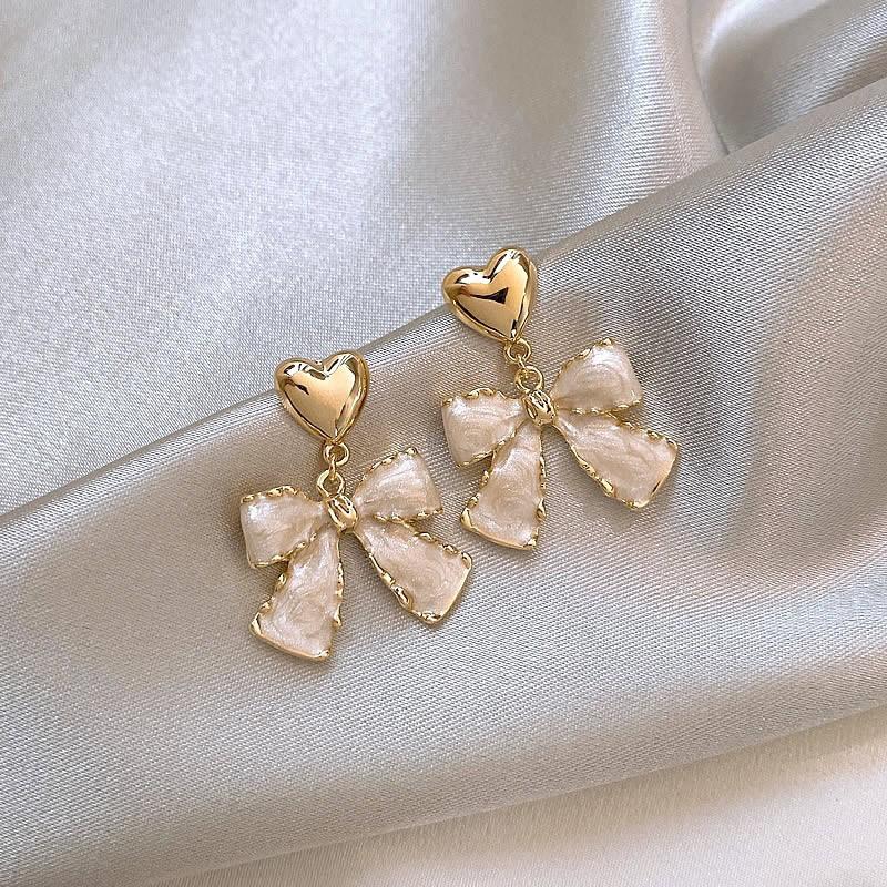 French white earrings, sweet bow love earrings ins design retro light luxury high-end stud earrings