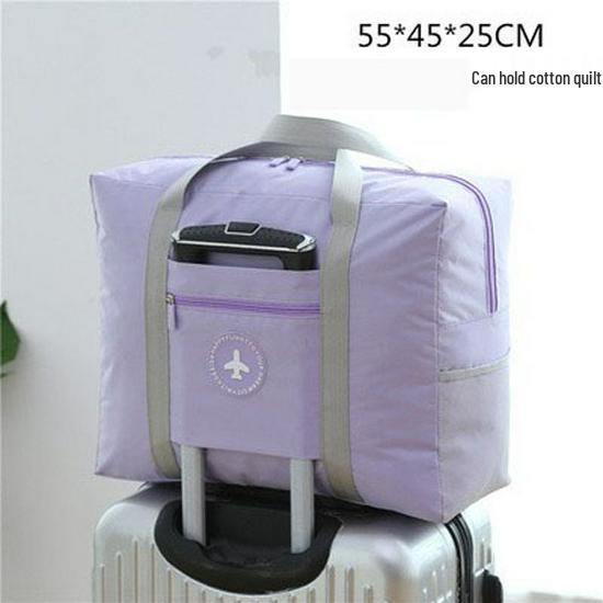 Compact travel bag: suitcase-compatible, hand-held, features an external pocket, handle slip-over design, with matching accessory bag.