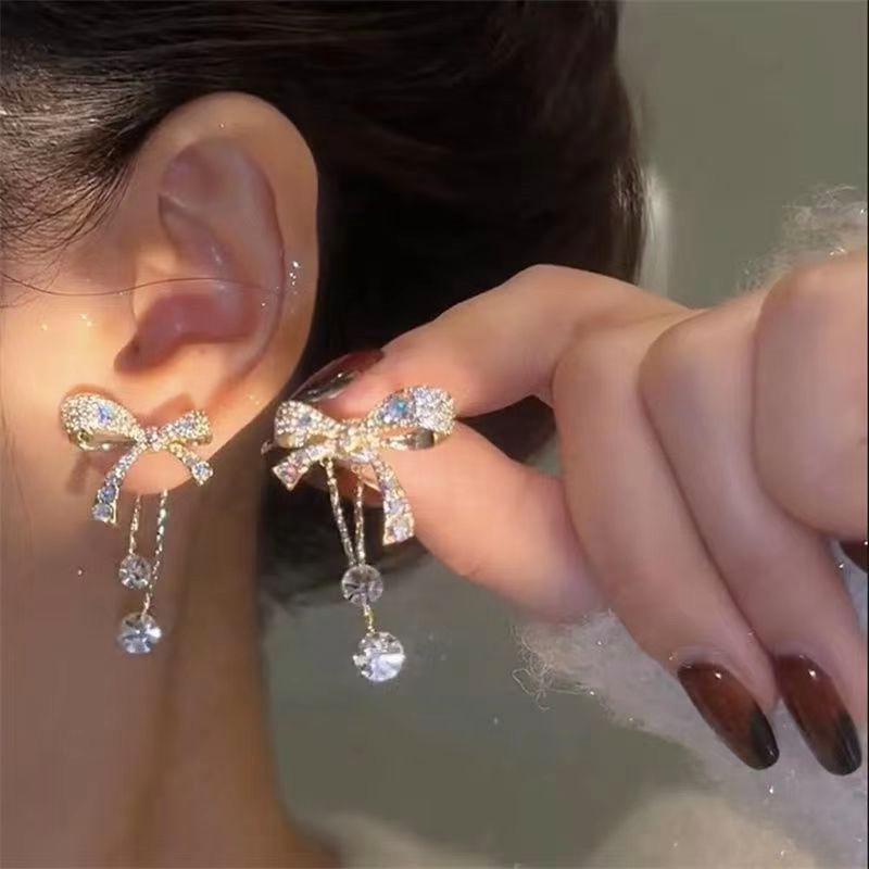 S952 Silver Needle Rhinestone Bow Asymmetrical Korean Earrings
