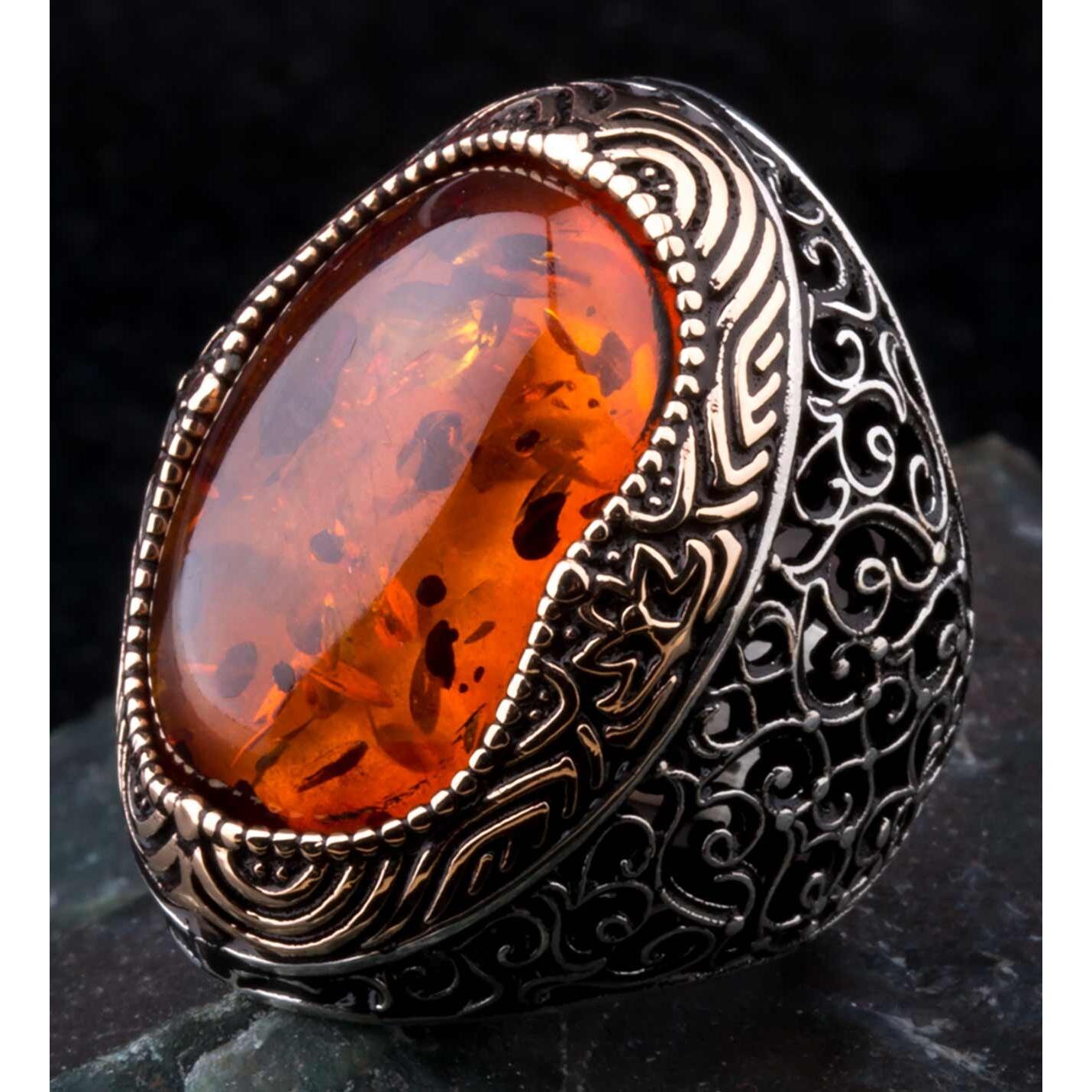 

Серебряное мужское кольцо с большим синтетическим камнем