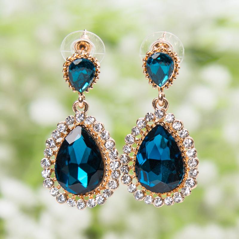 

Корейские серьги-подвески с кристаллами и стразами в форме капли павлин голубой