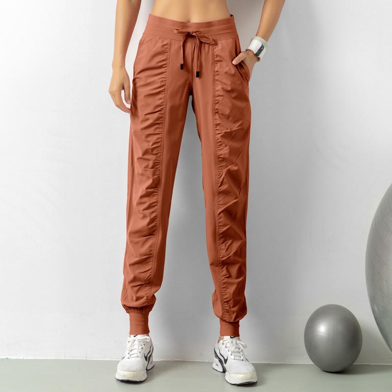 Women's Quick-Dry Yoga Fitness Nine-Point Cuffed Pants with Pockets