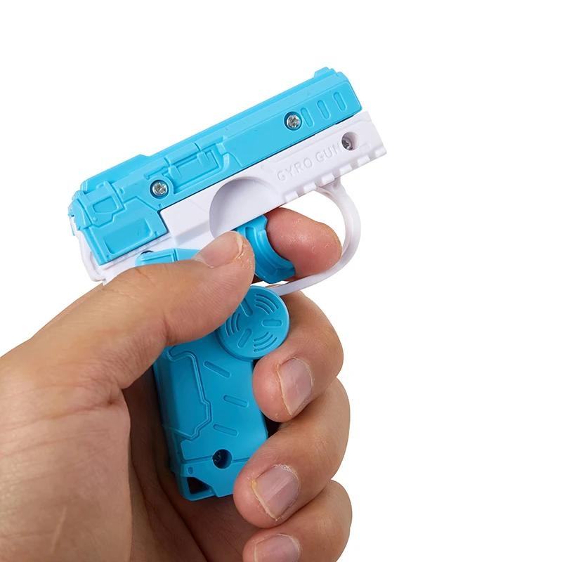 Model imprimat 3D Gravity Straight Jump Mini jucărie Pistol cu ​​morcovi Pistol de jucărie cu glonț cu ridichi Jucărie pentru ameliorarea stresului pentru copii Cadou de Crăciun