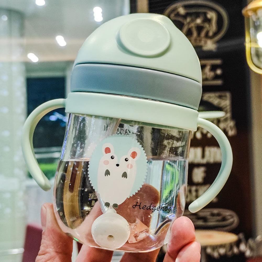 

250 мл Дитяча чашка для води з ручкою Навчальна чашка для пиття Мультяшні пляшки для води зелений