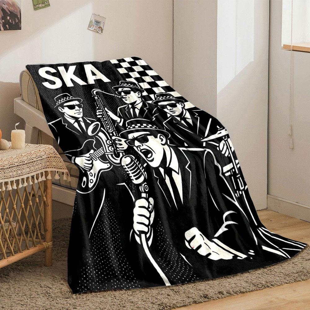 Black-and-white ska-themed band illustration with checkered patterns. for all seasons blanket lunch break throw gift