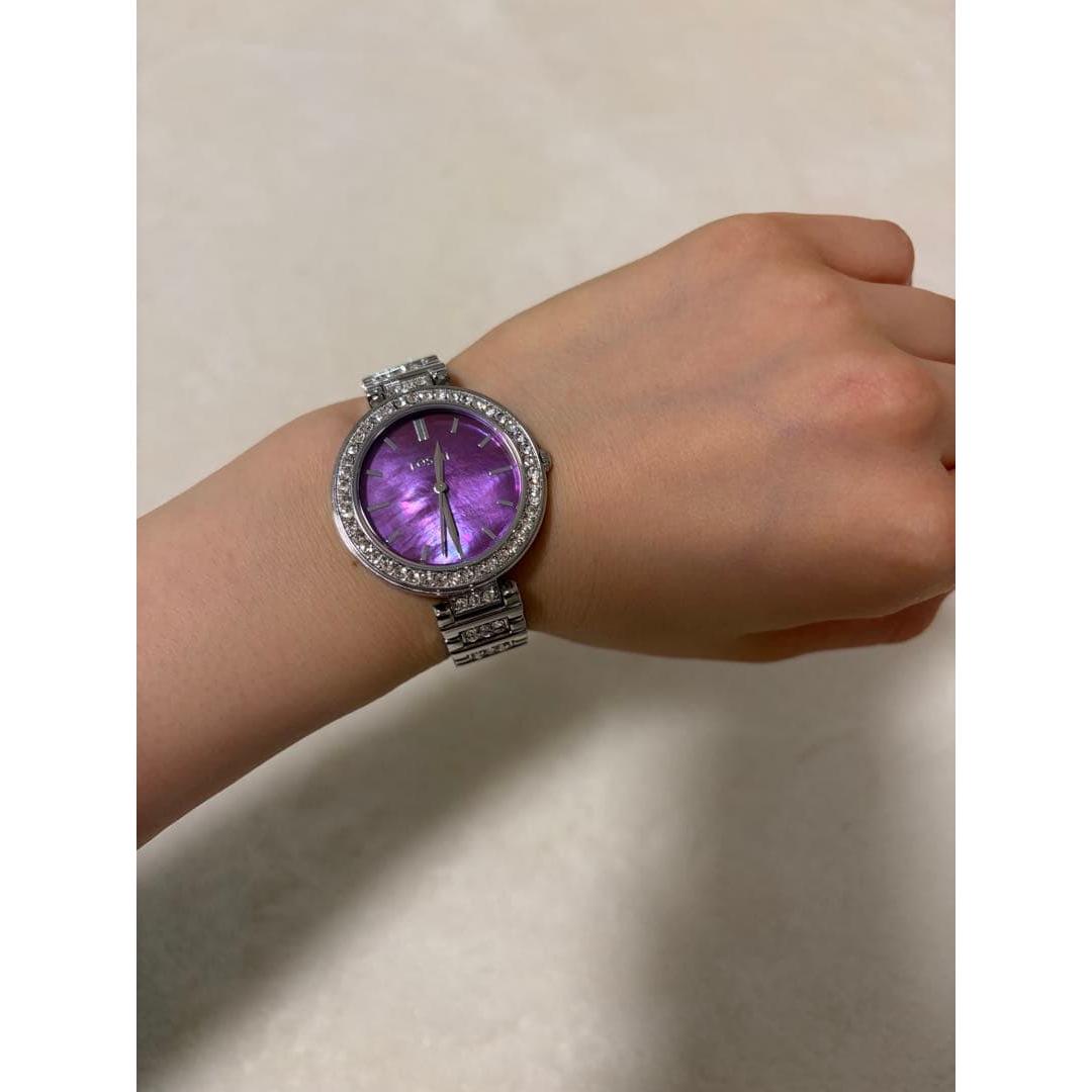 Used FOSSIL ladies watch purple dial