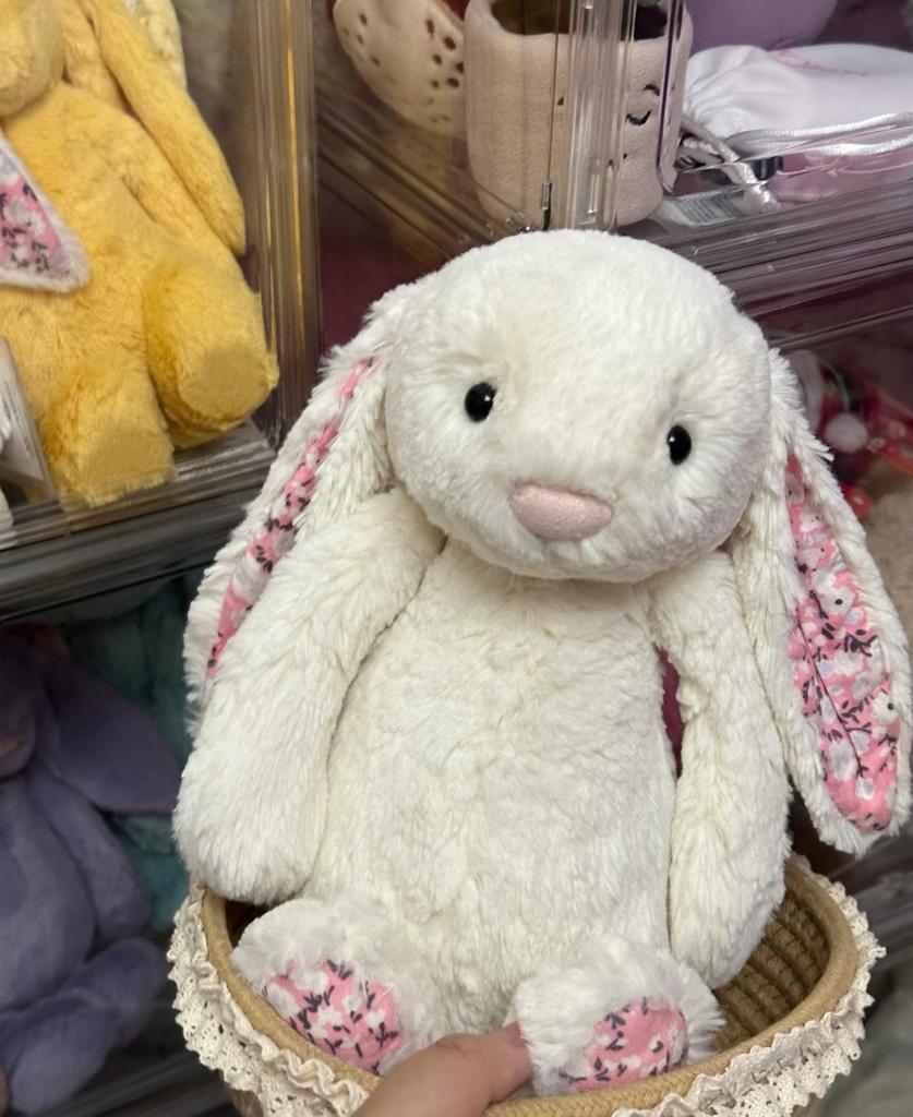 Floral Bunny Doll In White, Deep Pink, Light Pink, Brown, Grey, and Purple by Jellycat