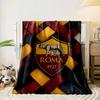 Woven diagonal pattern of black, red, yellow, and white textured strips. for all seasons blanket lunch break throw gift