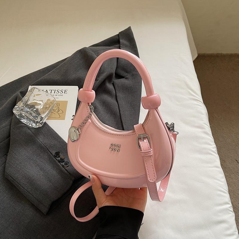 

2025 summer new crescent moon bag high value handbag fashion shoulder messenger bag casual simple hand carry women s bag розовый