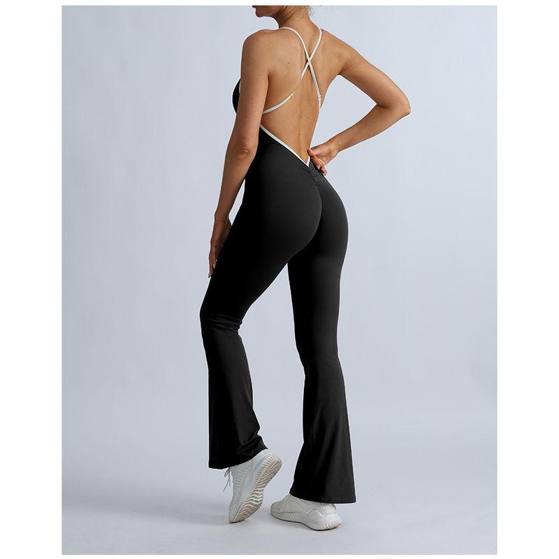 

Including Chest Pad Foreign Trade New Jumpsuit Women Beauty Back Color Matching Cross Peach Hip Sports Fitness Yoga One-Piece Trumpet pants Black L