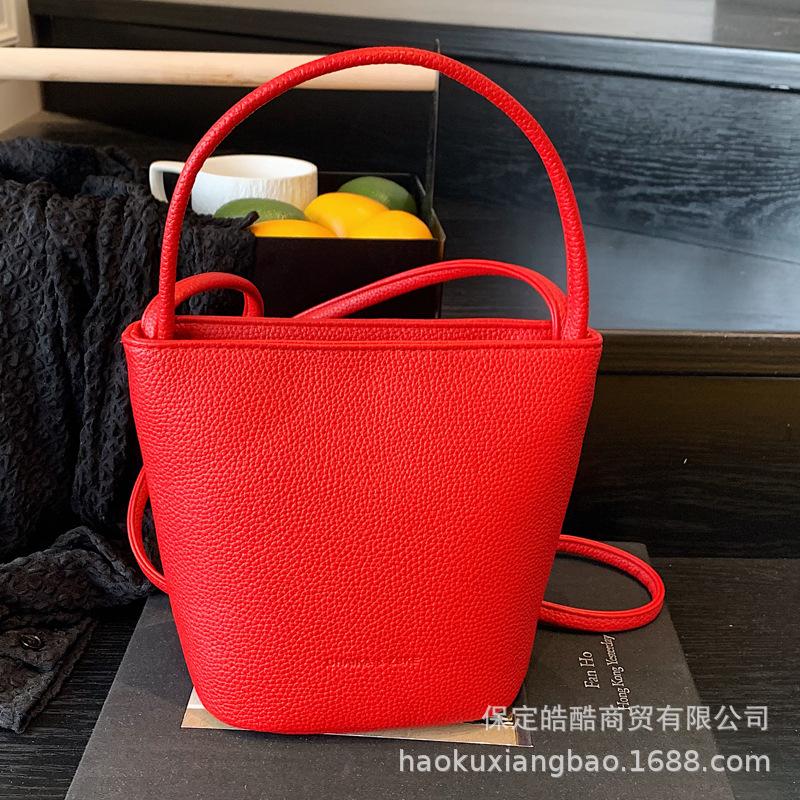 Simple and trendy hand-carried bucket bag women's 2025 spring and summer new fashion versatile shoulder bag niche high-end women's bag