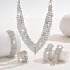 Luxus Diamantschmuckset: Glitzernde Halskette, Quastenohrringe, Armband und Ring für Bräute