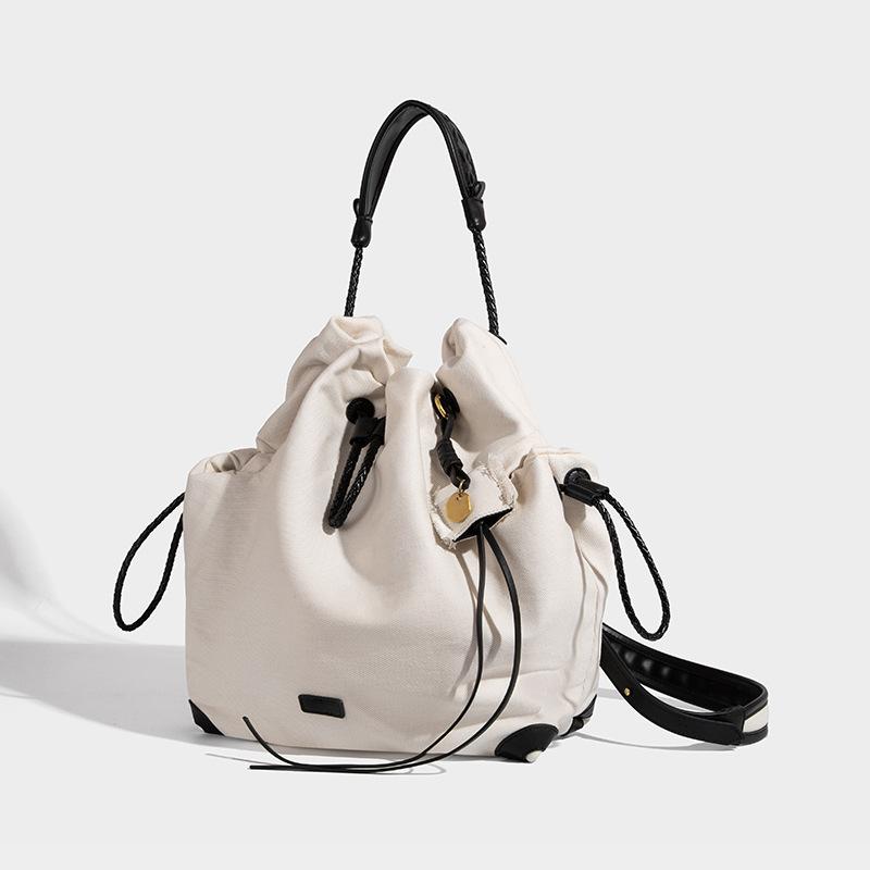 Niche Design Backpack for Women, Large Capacity 2025 New Vintage Canvas Commuter Drawstring Handbag School Bag