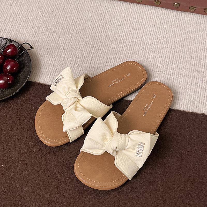 Summer flat-bottomed cool slippers women's new fashion outer wear holiday versatile bow student seaside beach shoes
