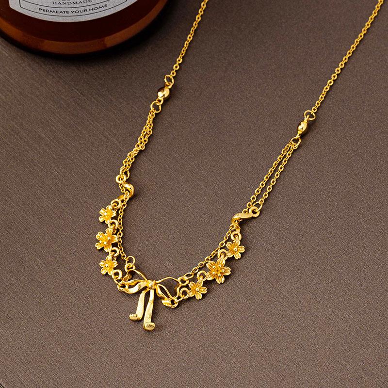 

Light Luxury Blooming Bow Gold Necklace - Long-lasting Color, Trendy Clavicle Chain for Women