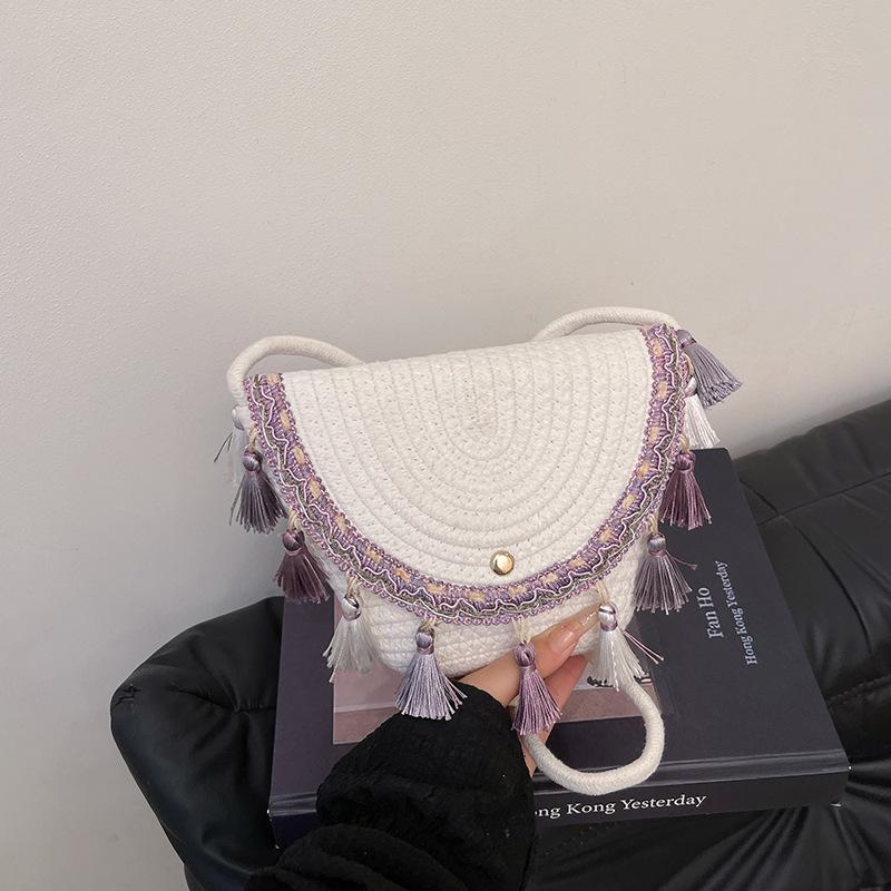 

Tassel ethnic style straw woven bag new hand carry women s bag envelope bag high-end woven tassel messenger bag фиолетовый