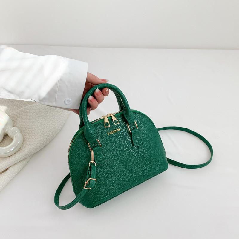 

Fashionable Retro Shell Bag For Women 2023 Spring Trendy Simple Shoulder Bag Handheld Casual Commuting Crossbody Bag StyleE
