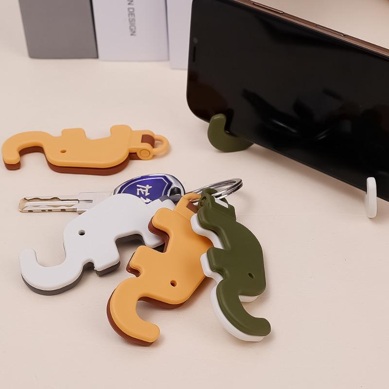 Soporte de Teléfono de Dibujos Animados Lindo Elefante Soporte de Escritorio para Teléfono Móvil Tablet Colgante Llavero Soporte Portátil Mini Pata de Apoyo