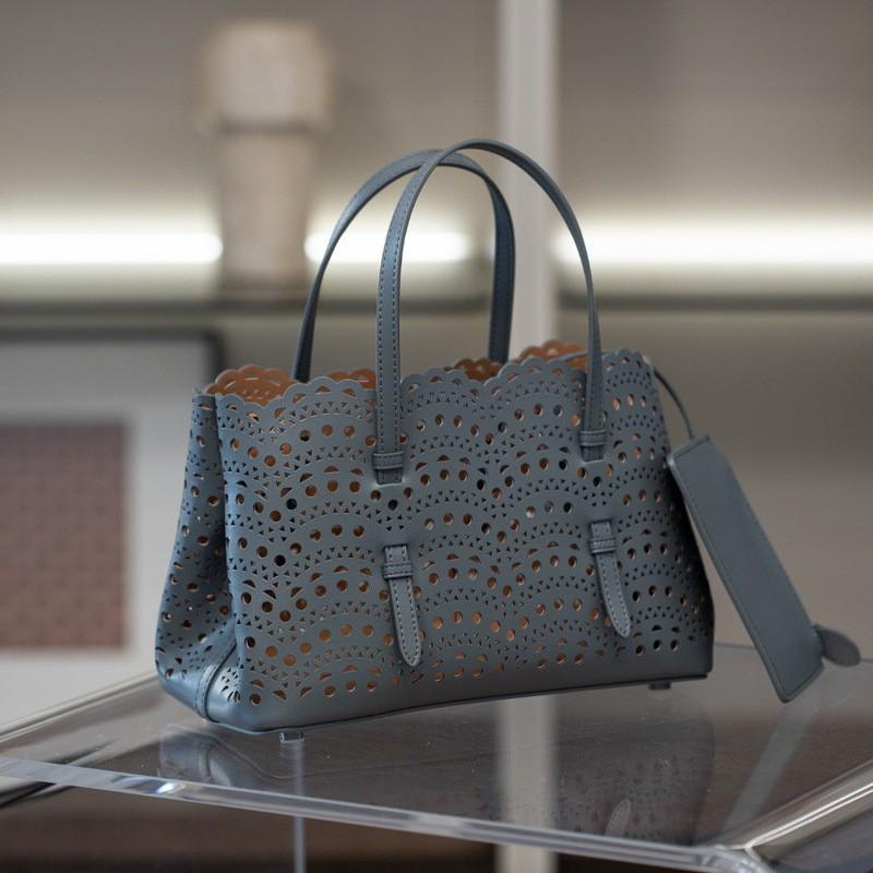 2026 Genuine Leather Women's Bag Tote French Hollowed-out Carved 25 Portable Cross-body Lazy Vegetable Basket