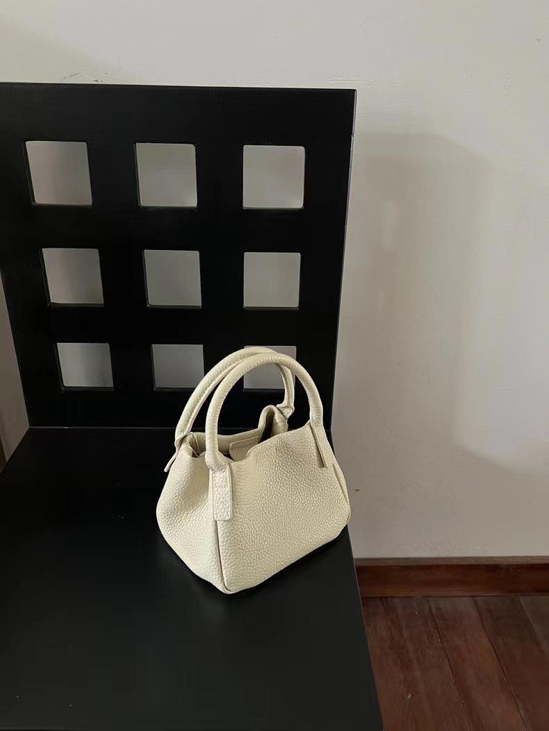 

Универсальная сумка-ведро 2023 года — уникальный дизайн для ношения на плече и в качестве сумки-мессенджера