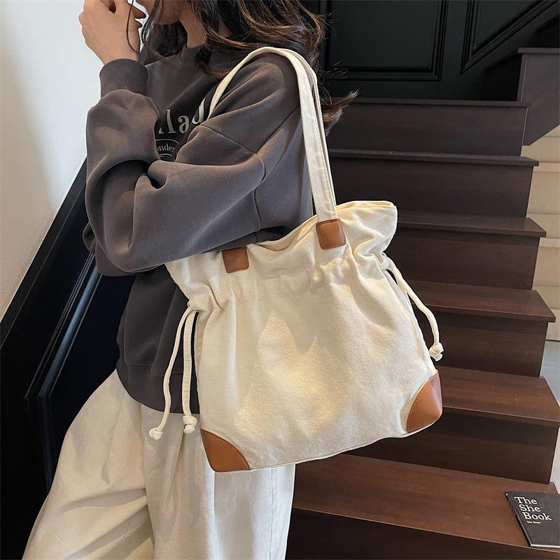 Casual Lazy Wind Simple Capacity Canvas Bag Women 2025 New Simple Korean Version Versatile Shoulder Bucket Bag