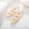 Bohemian Daisy Stud Earrings: Handmade Raffia Sunflower Style