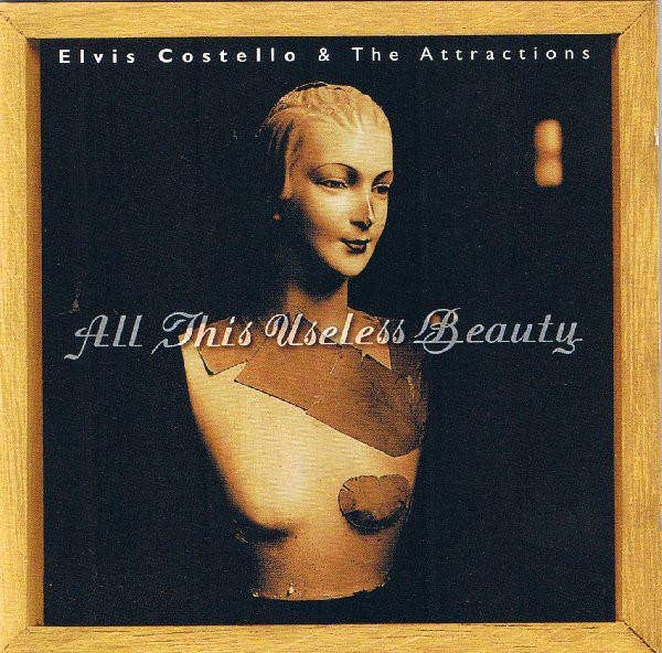 

CD ELVIS COSTELLO THE ATTRACTIONS All This Useless Beauty 9362461982 Warner Bros. Re 1996 Europe Rock Used