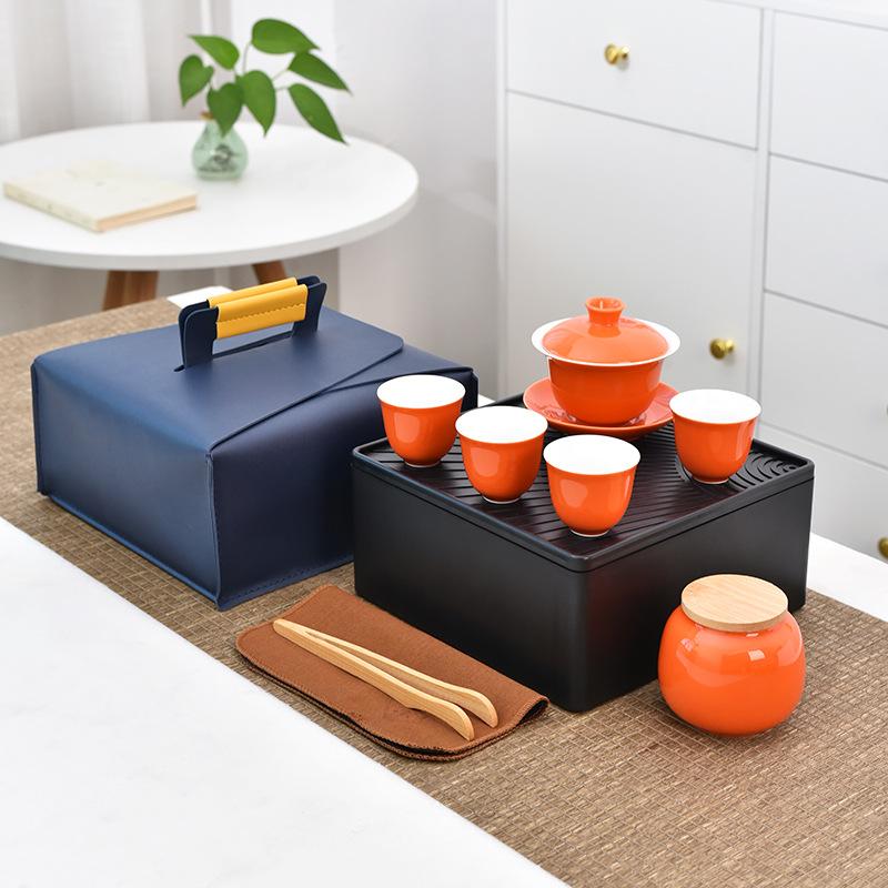 Creative ceramic travel tea set cover, cover bowl, cool pot, one pot, four cups, tea tray storage bag, business gift.