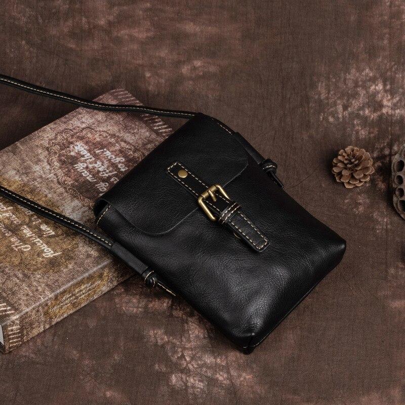 Johnature Eenvoudige lederen kleine dames schoudertassen Natuurlijke zachte koeienhuid Effen kleur Veelzijdige mobiele telefoon Crossbody tas zwart
