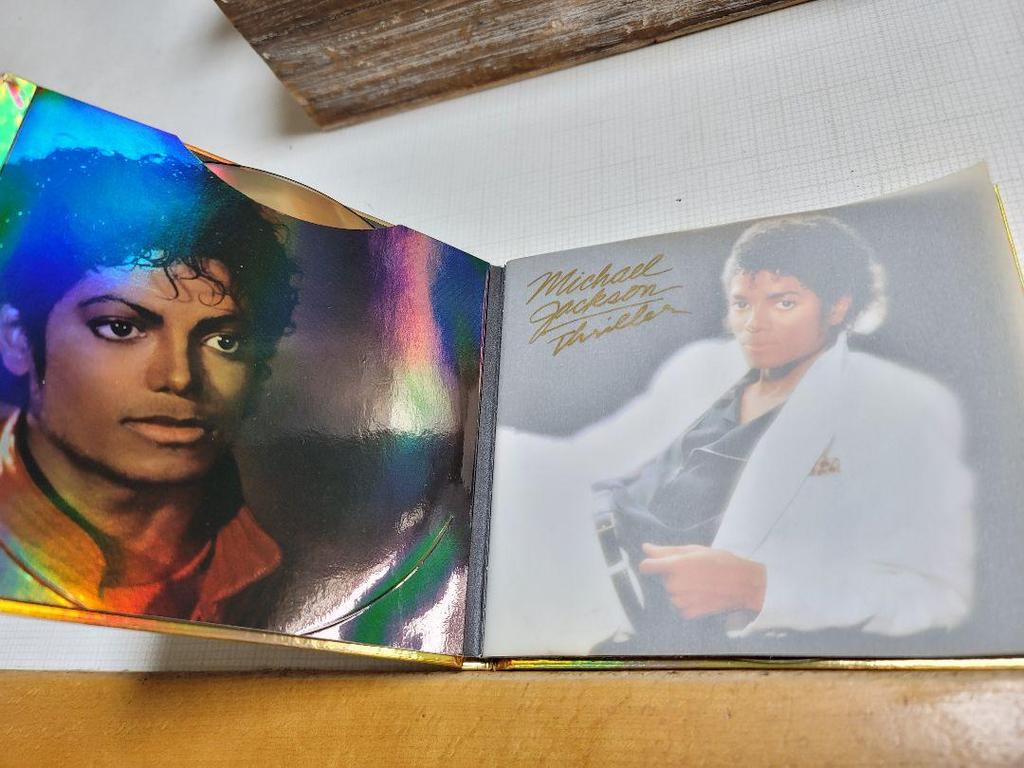 [USED] Thriller 25th Anniversary Edition, OFF THE WALL, and 3 Moonwalker DVDs.